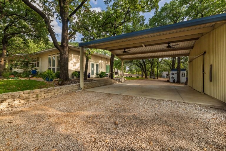 Covered carport and gravel drive at 1311 Mount Gilead Rd, Keller TX