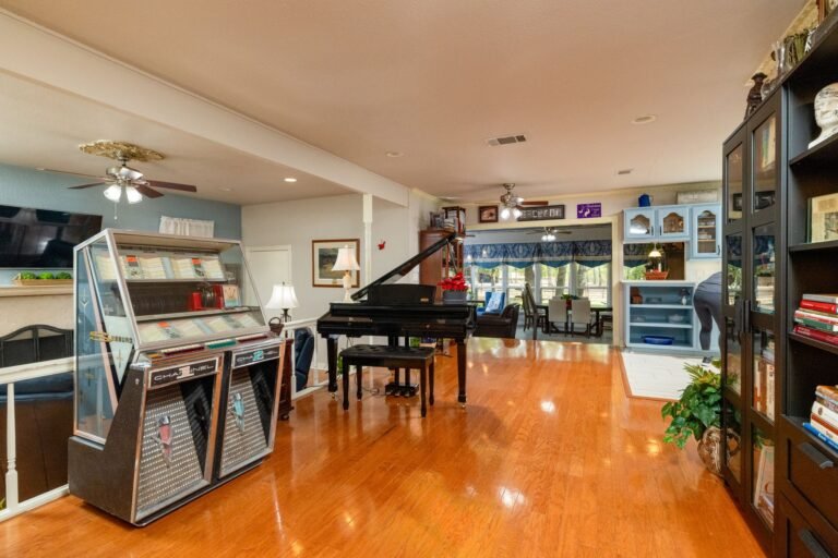 Open living area with wood floors at 1311 Mount Gilead Rd, Keller TX