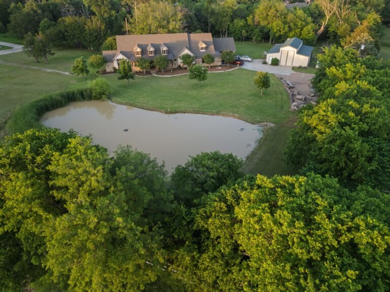 Aerial view of the home and pond at 1331 Bancroft Road, Keller TX