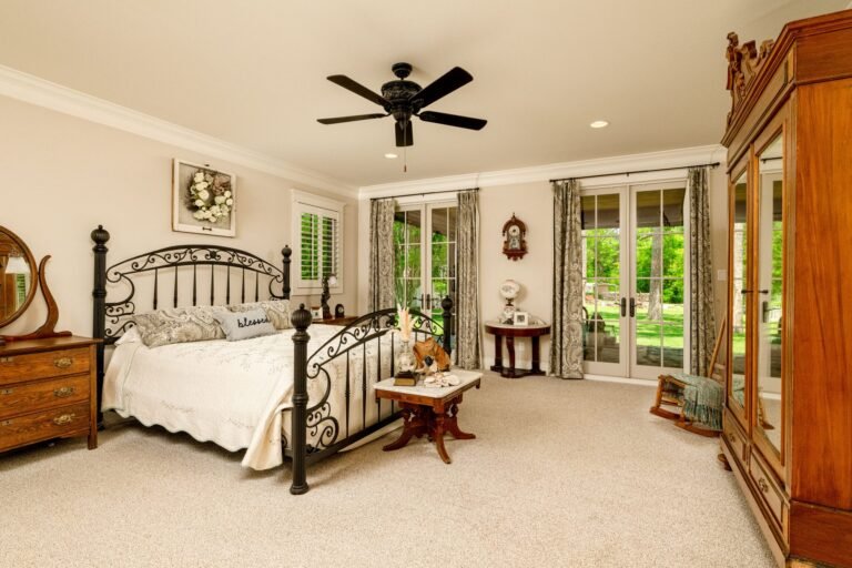 Primary bedroom with French doors at 1331 Bancroft Road, Keller TX
