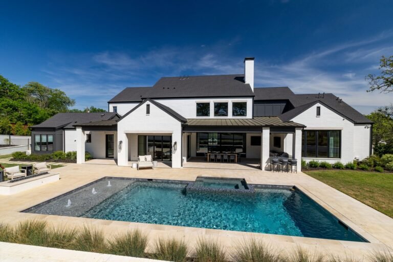 Rear exterior of 1412 Chelsea Rae Lane, Keller TX, with pool and covered patio on a 0.87-acre lot