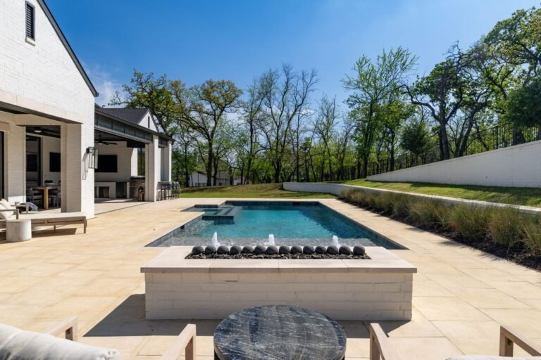 Fire pit beside the pool at 1412 Chelsea Rae Lane, Keller TX